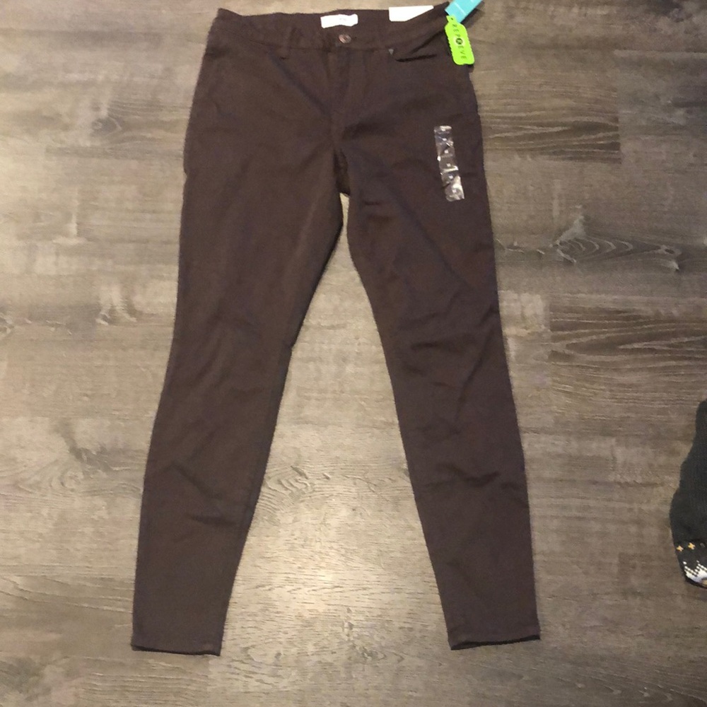 Dark brown super skinny Maurice’s jeggings.